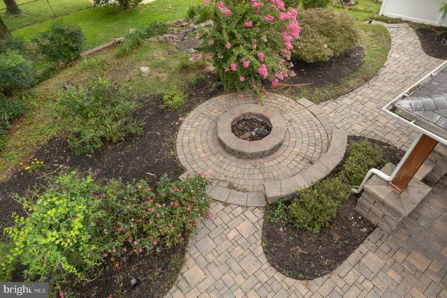 a kitchen with a sink stainless steel appliances and cabinets