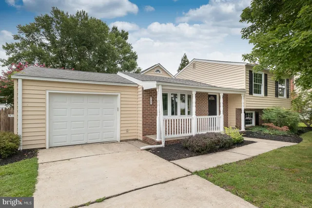 a house view with a garden space
