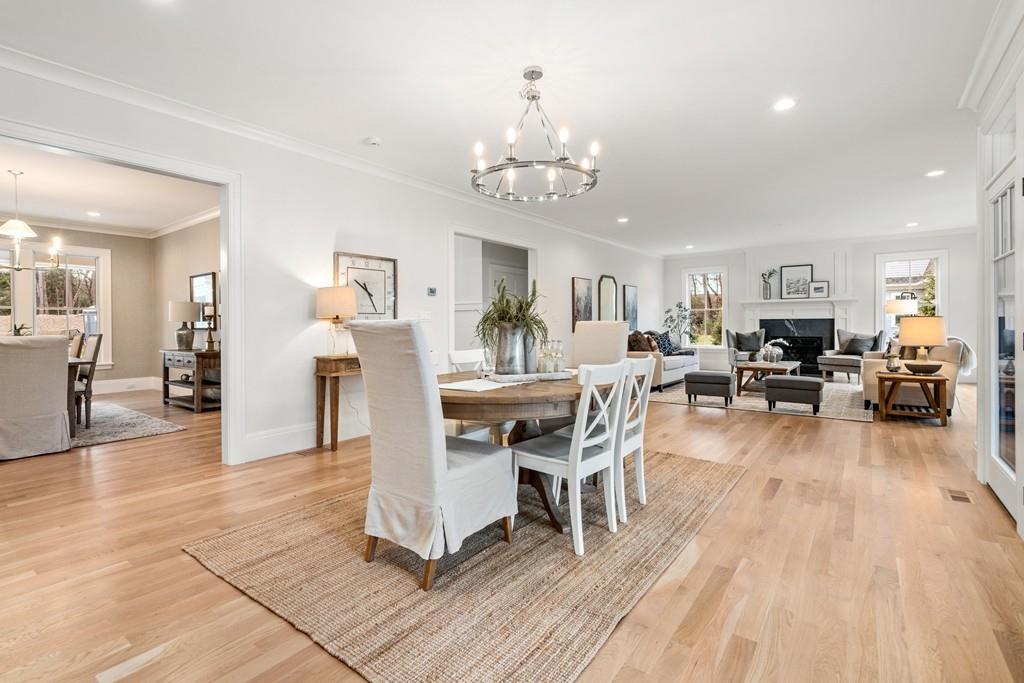 5 Stone Ridge Lane Weston, MA 02493 - Photo 13 of 40 a view of a dining room with furniture and wooden floor