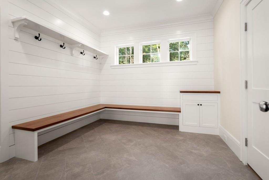 5 Stone Ridge Lane Weston, MA 02493 - Photo 17 of 40 a bathroom with a bathtub and shower