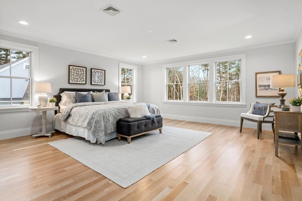 5 Stone Ridge Lane Weston, MA 02493 - Photo 19 of 40 a living room with a bed furniture and a window
