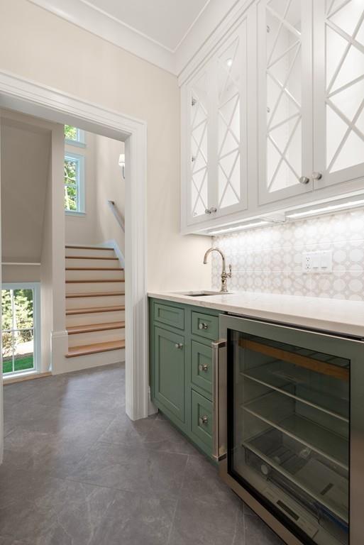 5 Stone Ridge Lane Weston, MA 02493 - Photo 25 of 40 a bathroom with a sink and a mirror