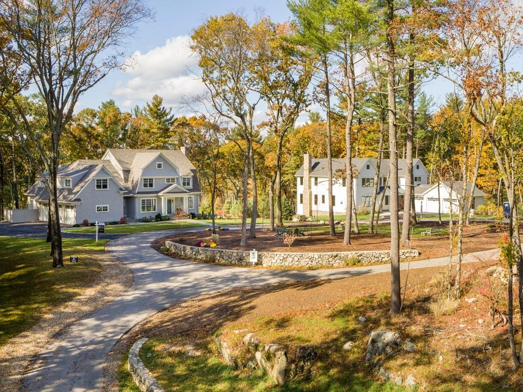 5 Stone Ridge Lane Weston, MA 02493 - Photo 38 of 40 a front view of a house with a yard