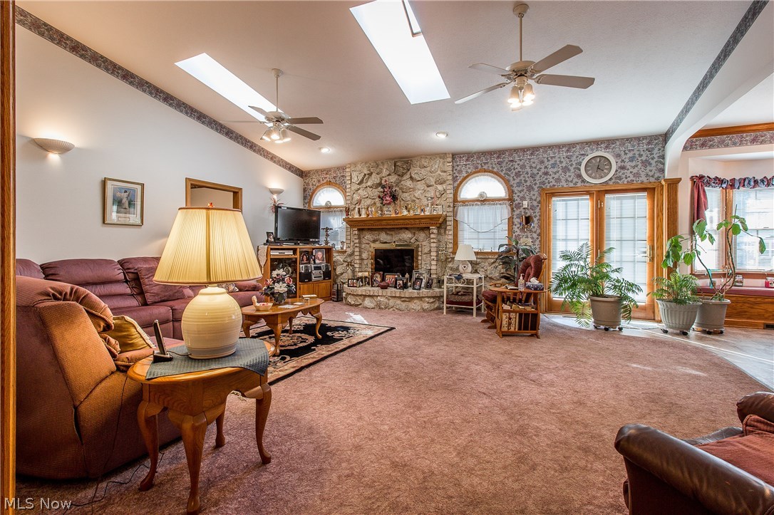 347 Oneida Avenue Northwest Canton, OH 44708 - Photo 5 of 21 Living room with gas fireplace