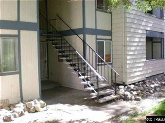 2080 Highview Court, Unit 5 Reno, NV 89512 - Photo 1 of 9 a view of entryway and hall with wooden floor