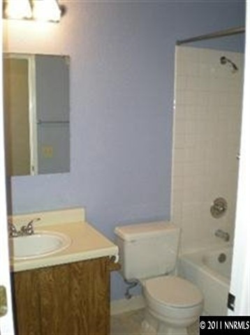 2080 Highview Court, Unit 5 Reno, NV 89512 - Photo 7 of 9 a bathroom with a sink a toilet and shower