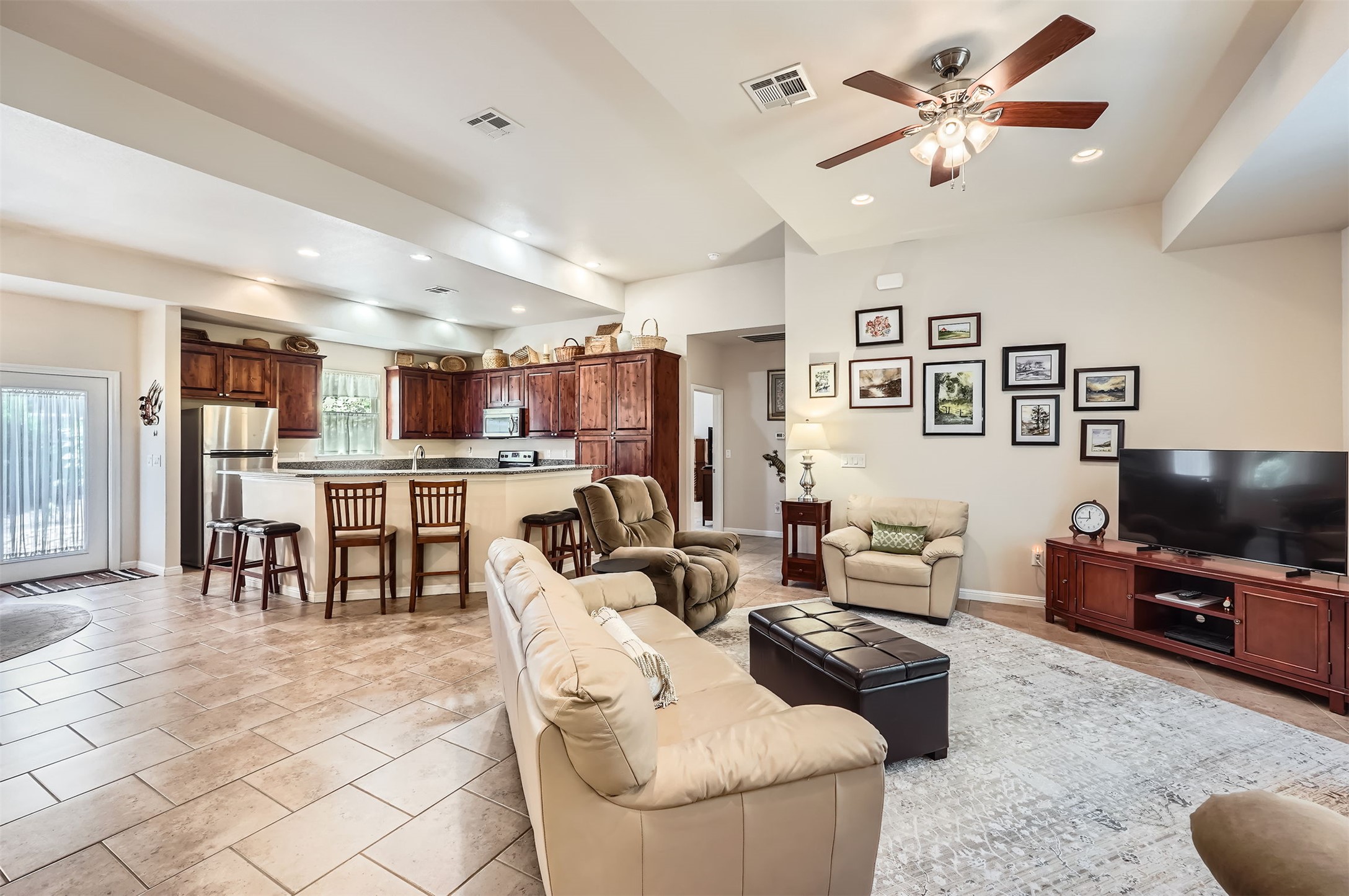 5501 Hitching Post Lago Vista, TX 78645 - Photo 7 of 26 a living room with furniture and a flat screen tv