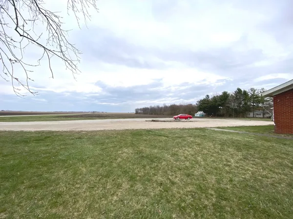 a view of a yard with an outdoor space