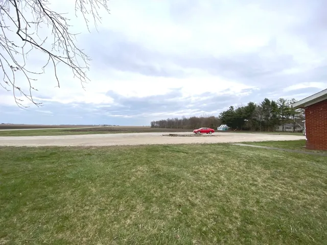 a view of a yard with an outdoor space