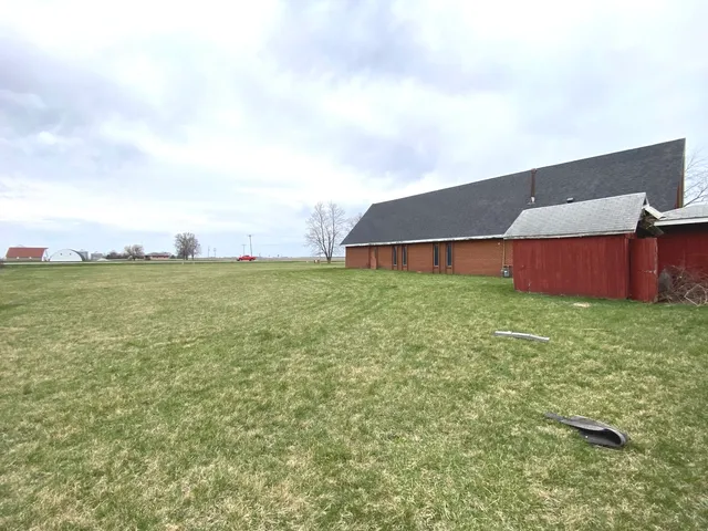 a view of a house with a street