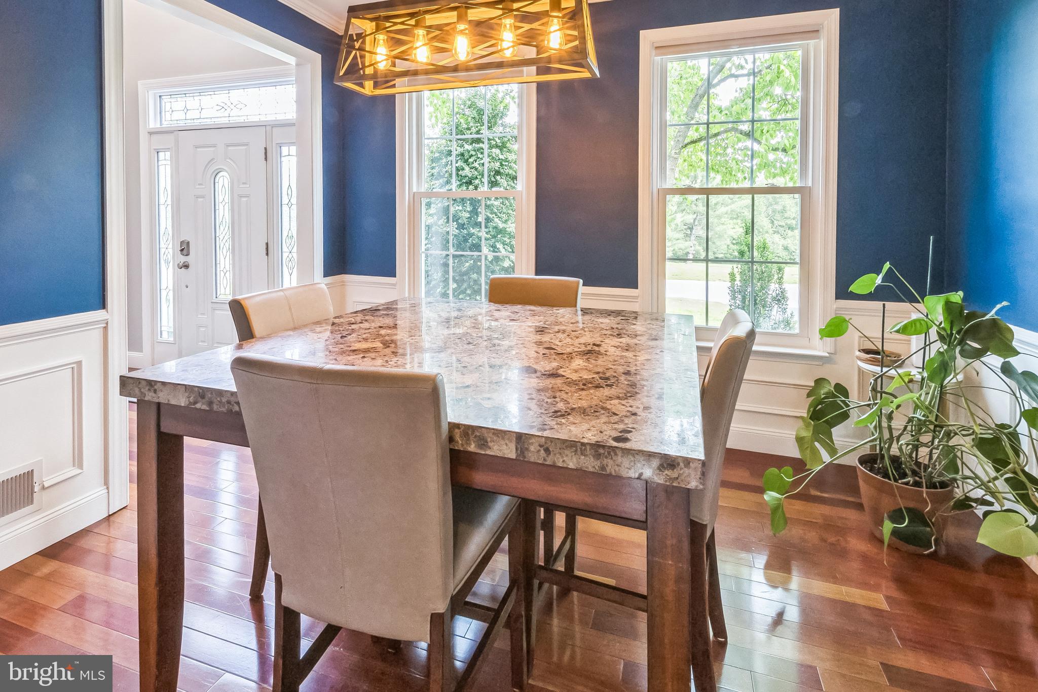 26 Emerald Ridge Drive Bear, DE 19701 - Photo 11 of 35 Elegant dining room with rich blue walls.