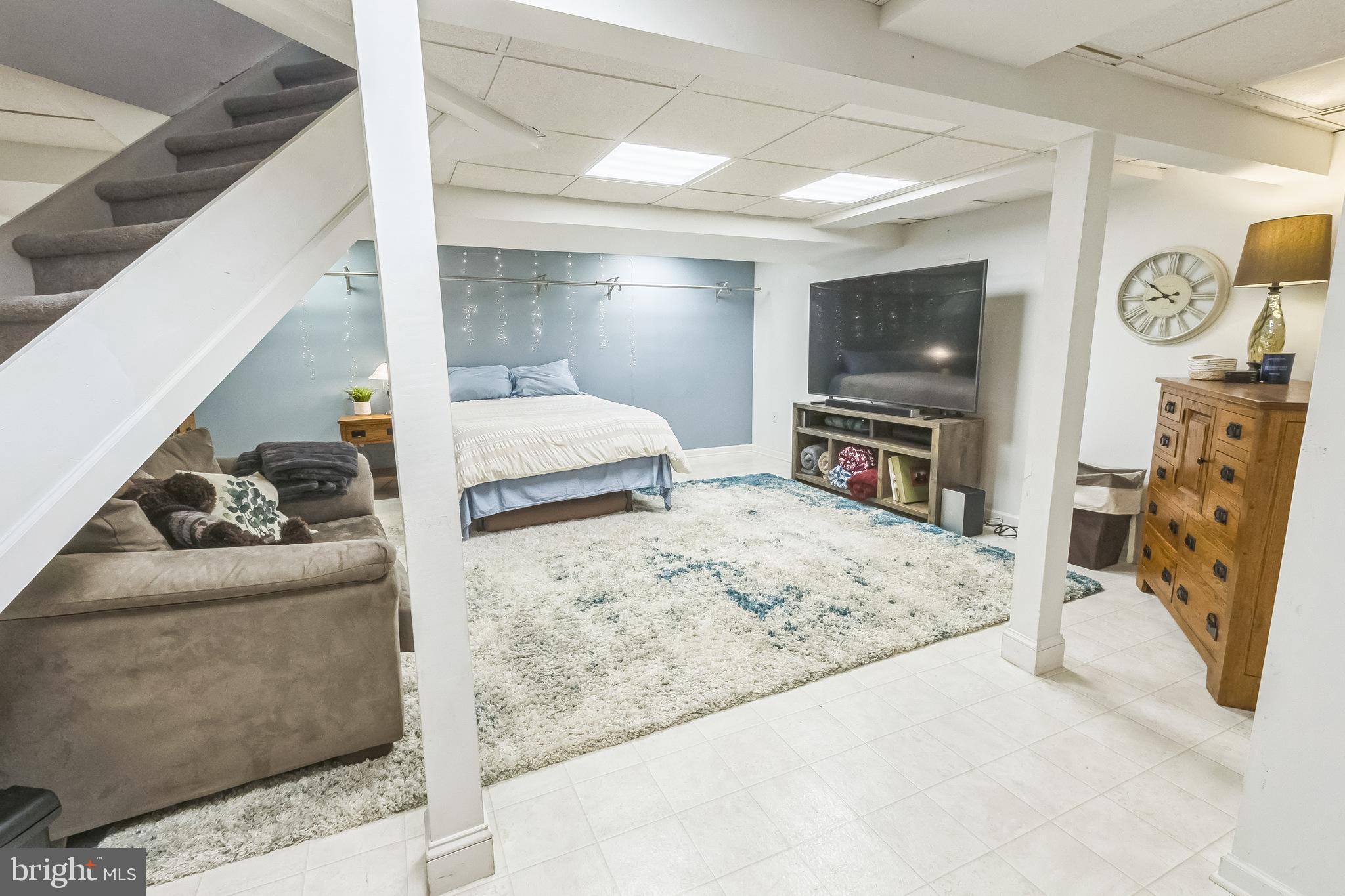 26 Emerald Ridge Drive Bear, DE 19701 - Photo 22 of 35 Cozy basement retreat with modern charm.