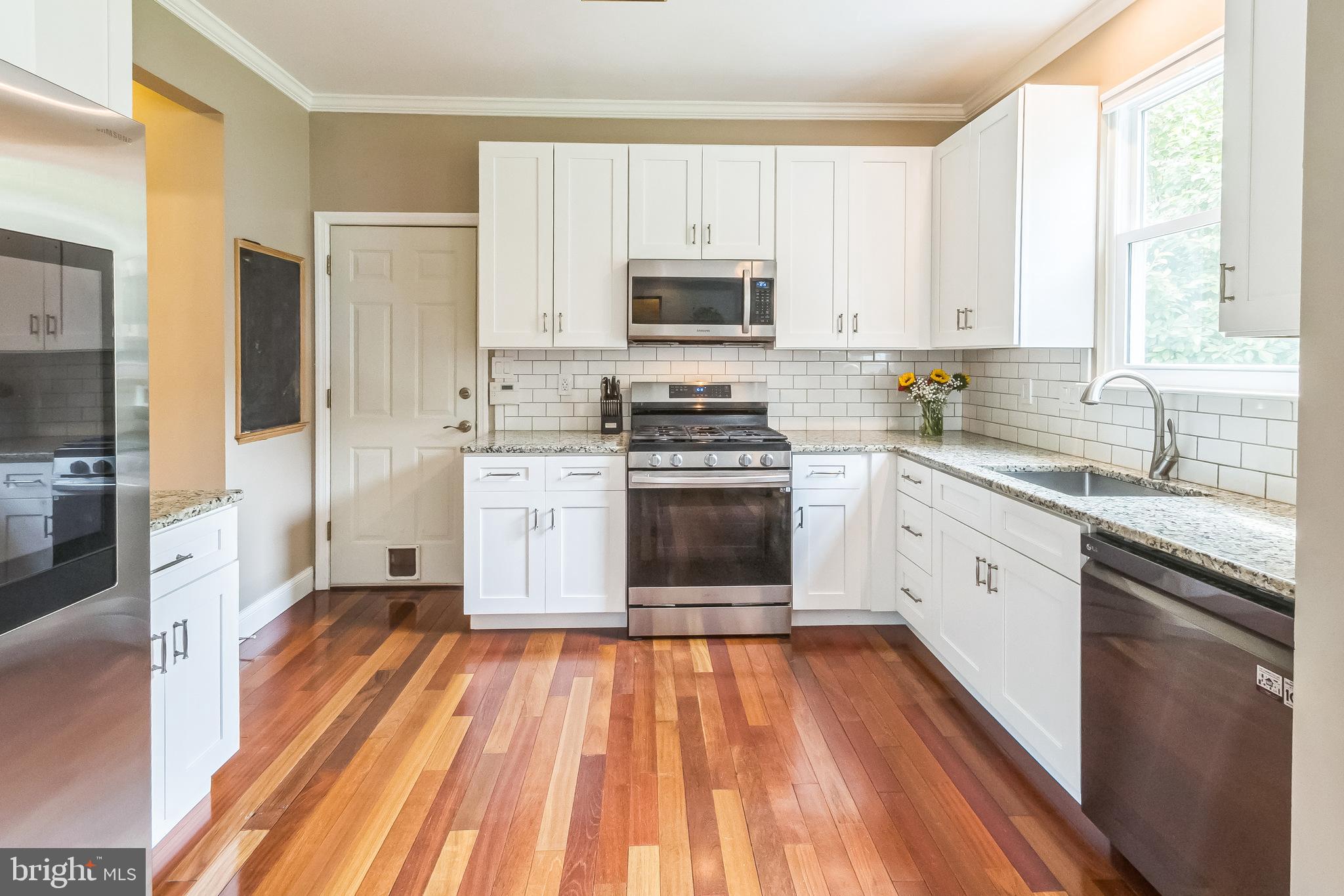 26 Emerald Ridge Drive Bear, DE 19701 - Photo 8 of 35 Updated modern kitchen w/ subway tile backsplash.