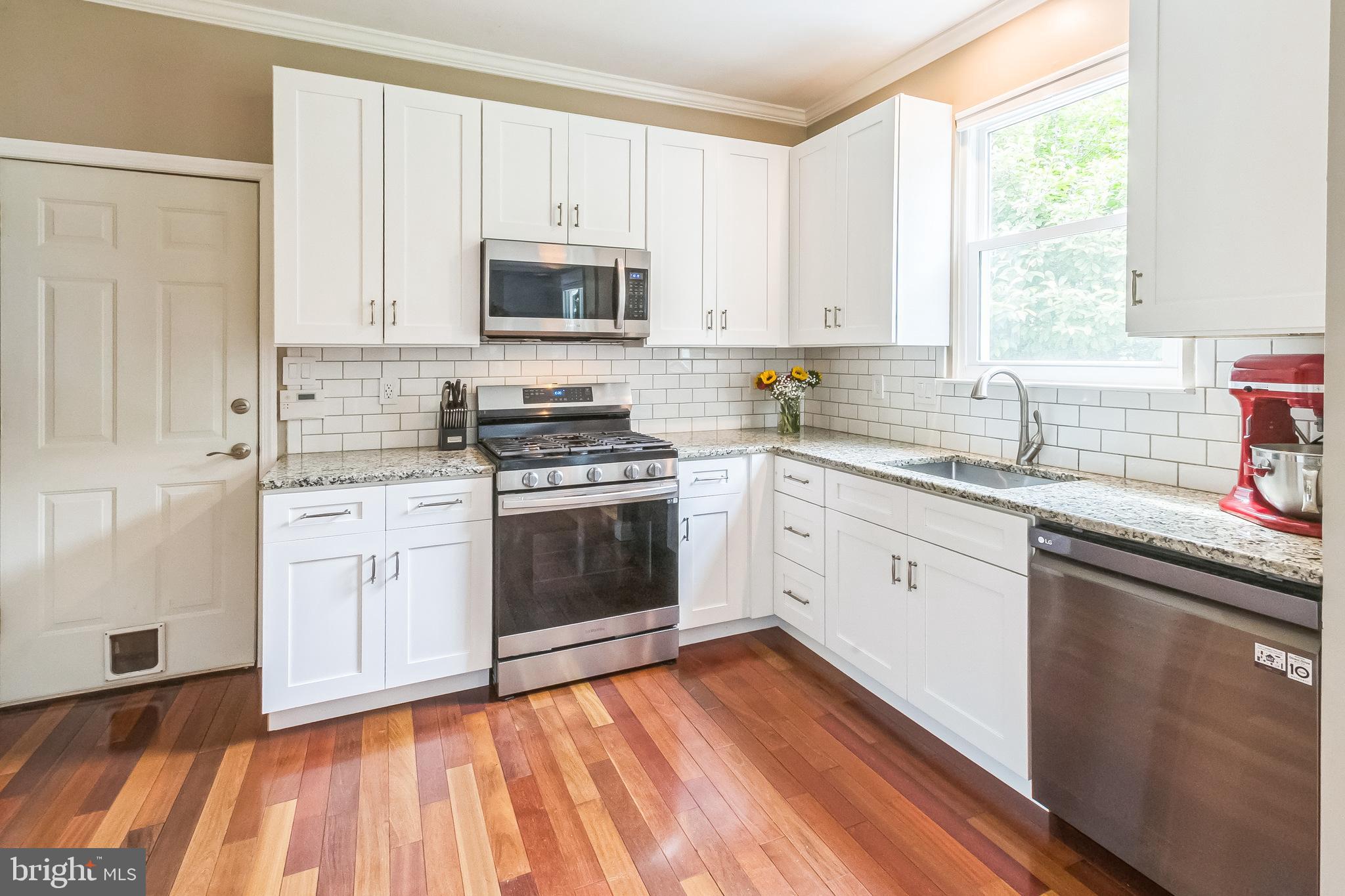 26 Emerald Ridge Drive Bear, DE 19701 - Photo 9 of 35 Bright and modern kitchen with elegant finishes.