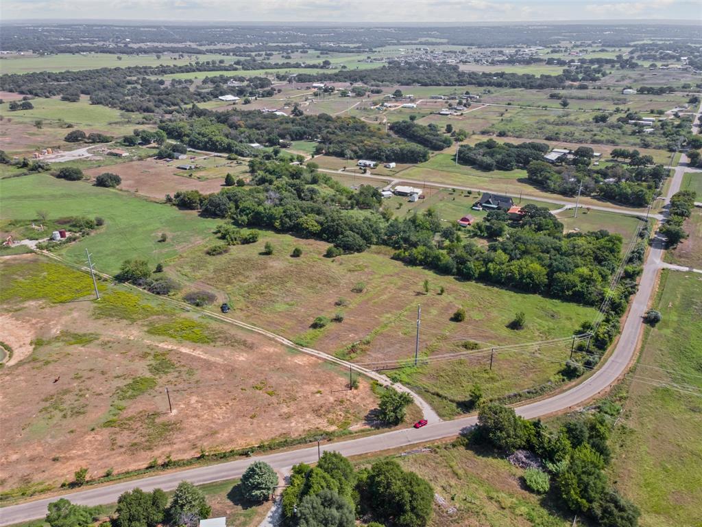 Tbd Springfield Road Springtown, TX 76082 - Photo 12 of 20 an aerial view of a house with a field