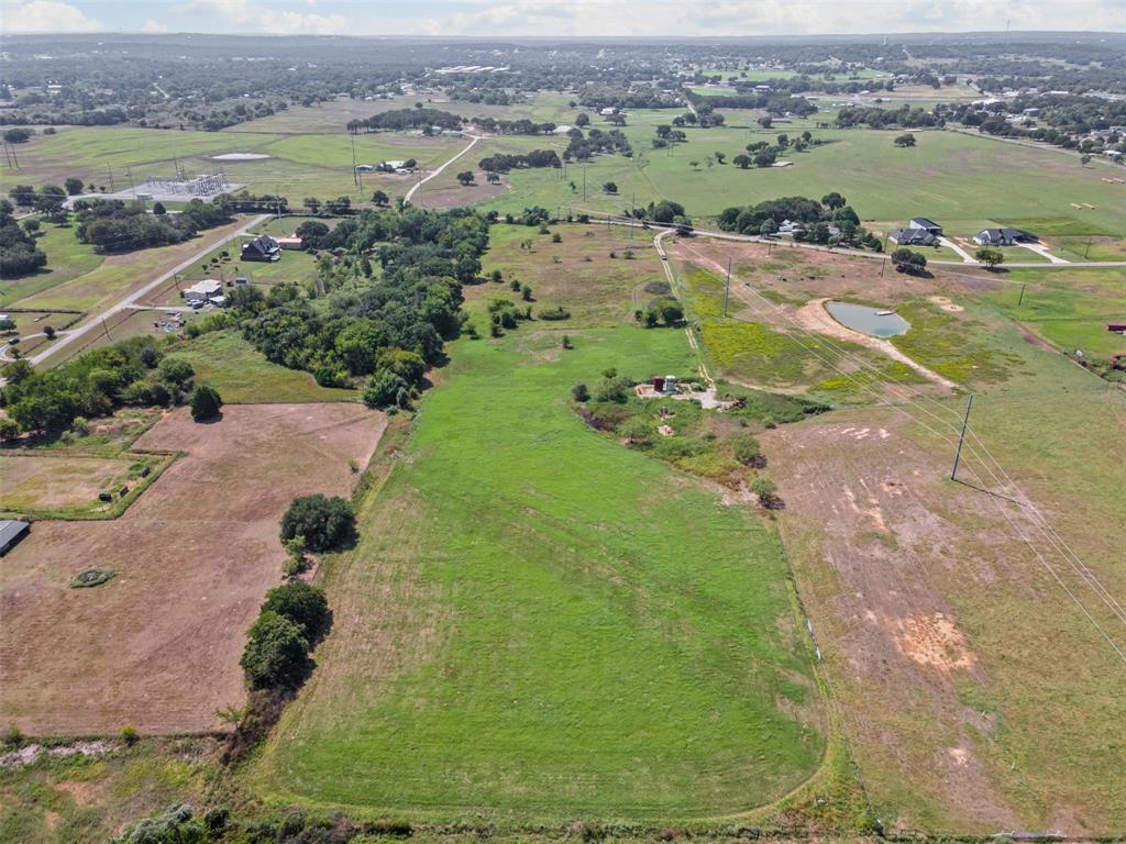 Tbd Springfield Road Springtown, TX 76082 - Photo 14 of 20 an aerial view of a houses with a yard