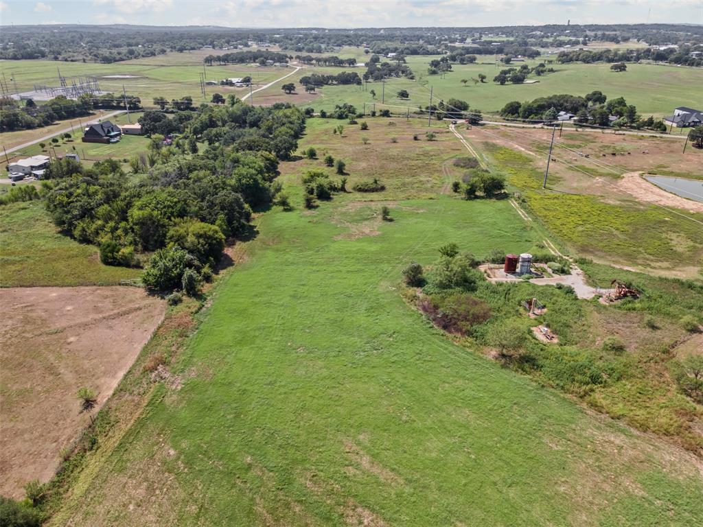 Tbd Springfield Road Springtown, TX 76082 - Photo 16 of 20 an aerial view of green landscape with trees
