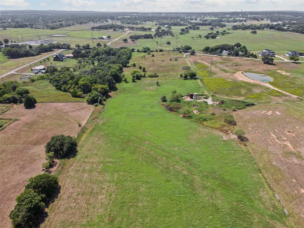 Tbd Springfield Road Springtown, TX 76082 - Photo 16 of 20 an aerial view of a houses with a yard