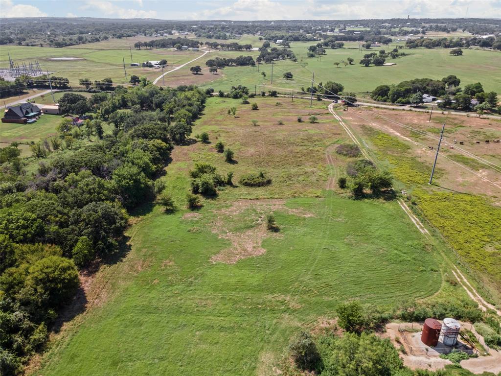 Tbd Springfield Road Springtown, TX 76082 - Photo 17 of 20 an aerial view of residential houses with outdoor space and river