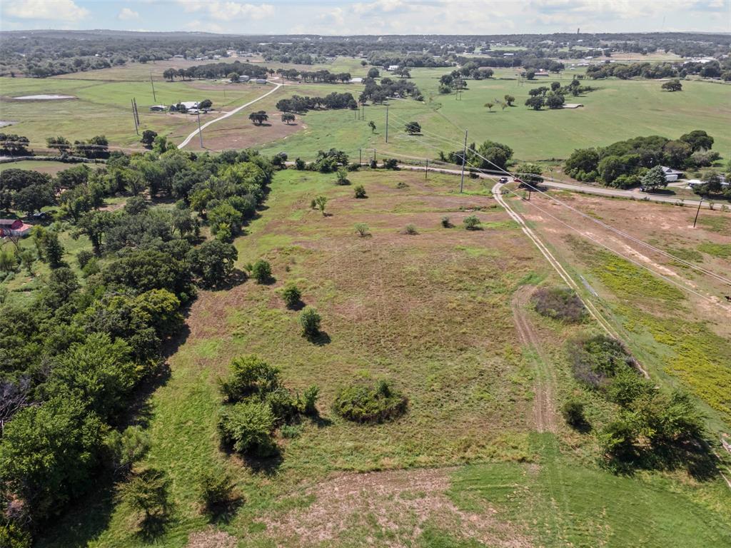Tbd Springfield Road Springtown, TX 76082 - Photo 18 of 20 an aerial view of a houses with outdoor space