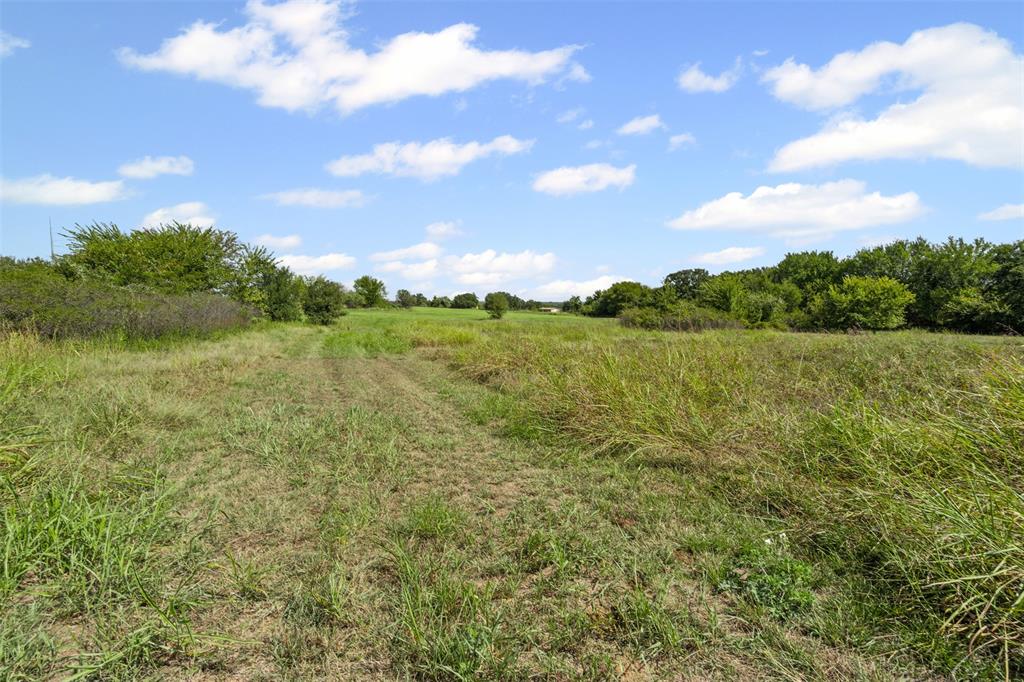 Tbd Springfield Road Springtown, TX 76082 - Photo 5 of 20 a view of a lake with houses in the back