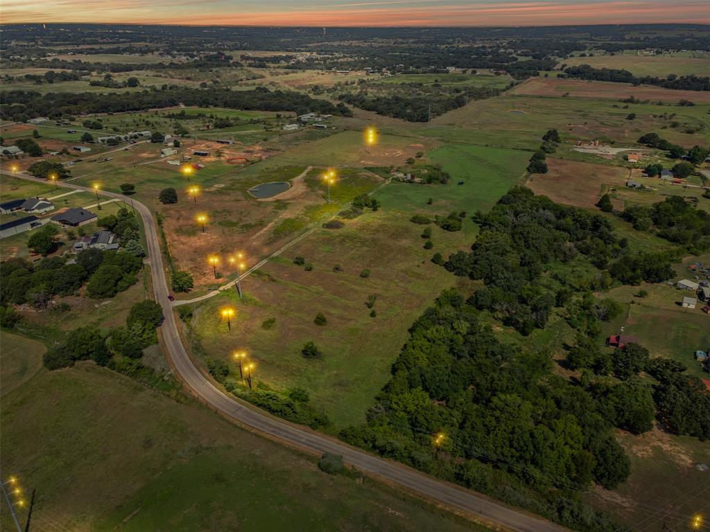 Tbd Springfield Road Springtown, TX 76082 - Photo 7 of 20 an aerial view of residential houses with outdoor space