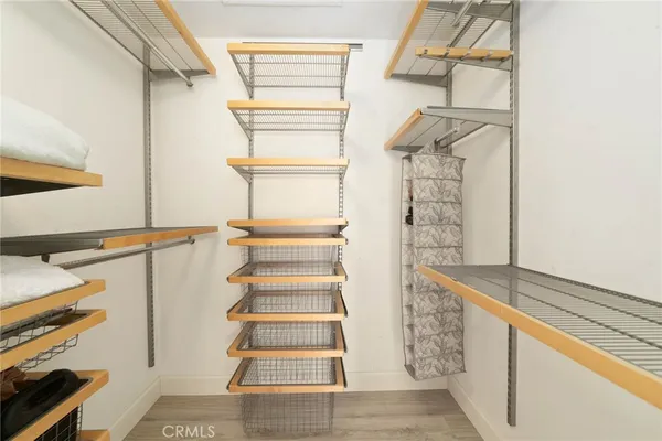 a view of staircase with white walls and a window