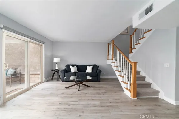 a view of livingroom with furniture and wooden floor