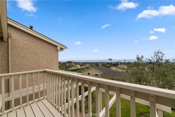 a view of a balcony with city view