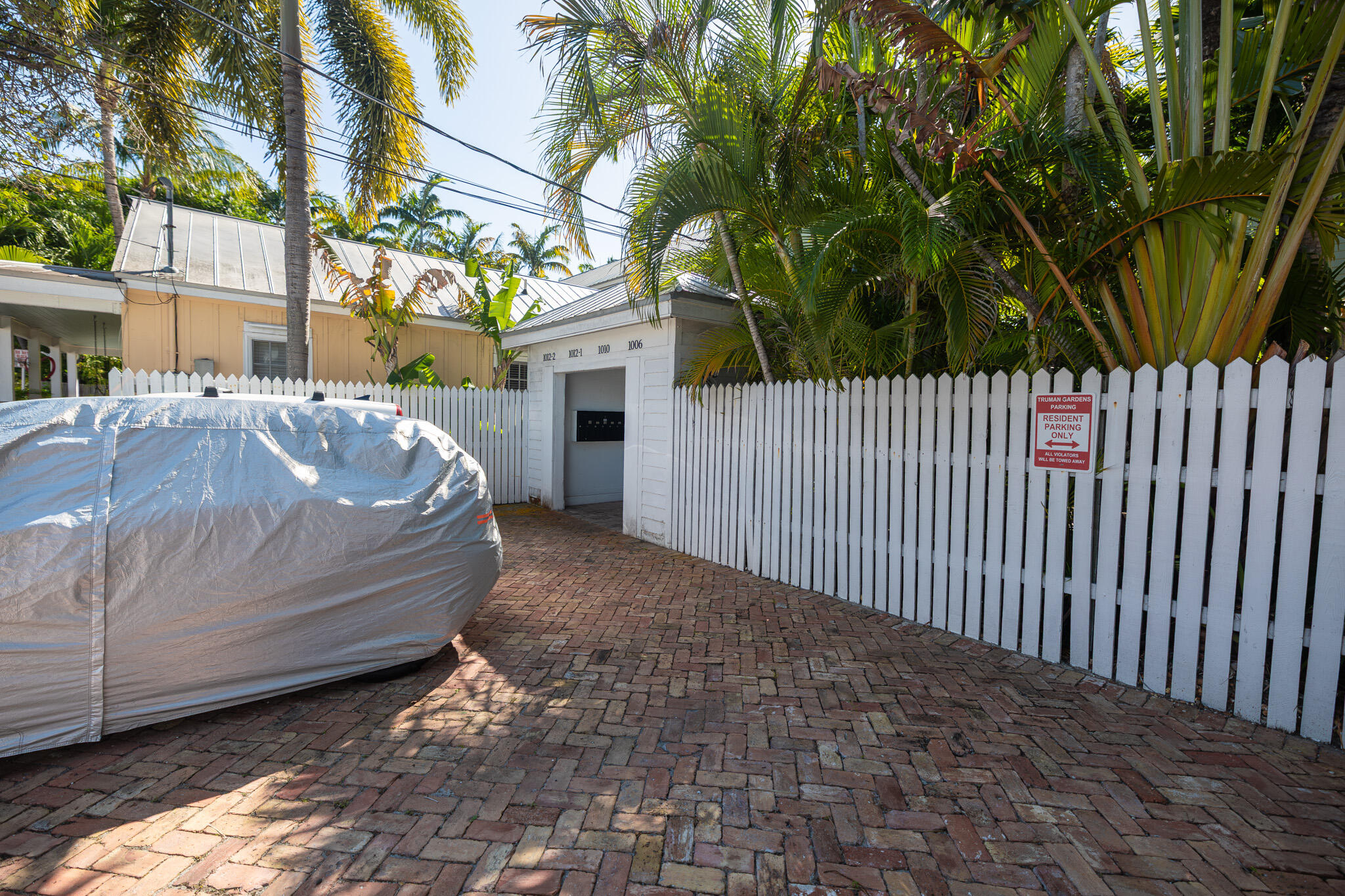 1012 Packer Street, Unit 7A Key West, FL 33040 - Photo 18 of 20 a view of a house with a yard