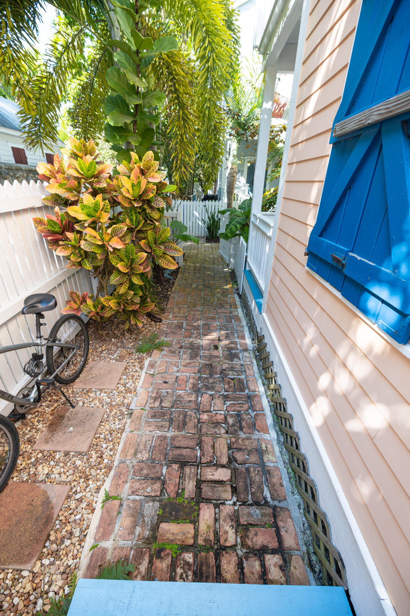 1012 Packer Street, Unit 7A Key West, FL 33040 - Photo 2 of 20 a view of a backyard with sitting area