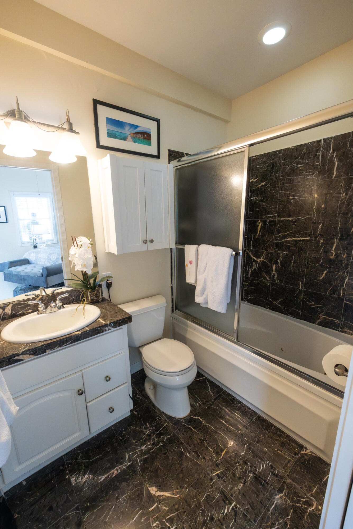 1012 Packer Street, Unit 7A Key West, FL 33040 - Photo 10 of 20 a bathroom with a sink toilet and shower