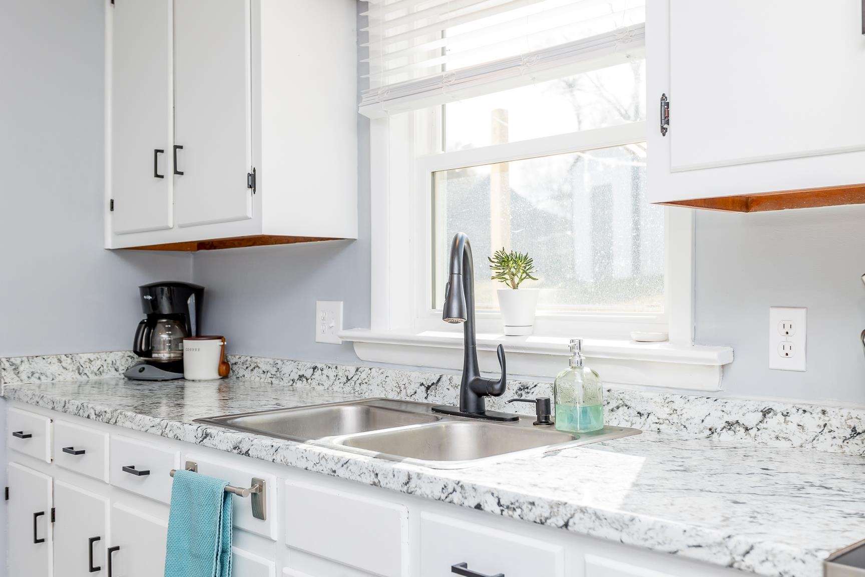 170 Quick's Mill Road Verona, VA 24482 - Photo 13 of 45 a kitchen with granite countertop a sink and a window