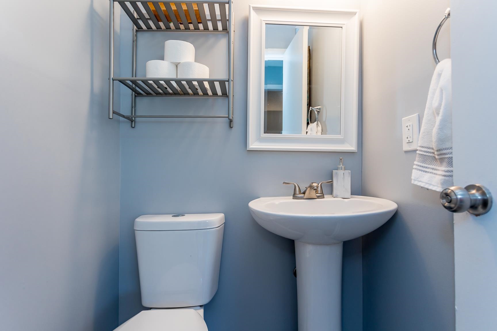 170 Quick's Mill Road Verona, VA 24482 - Photo 20 of 45 a bathroom with a sink a mirror and a toilet