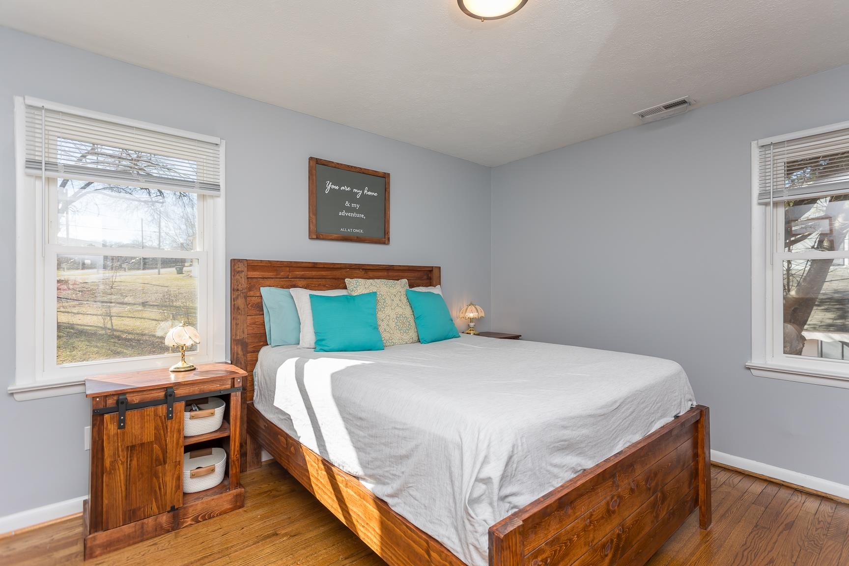 170 Quick's Mill Road Verona, VA 24482 - Photo 24 of 45 a large bed sitting in a bedroom next to a window