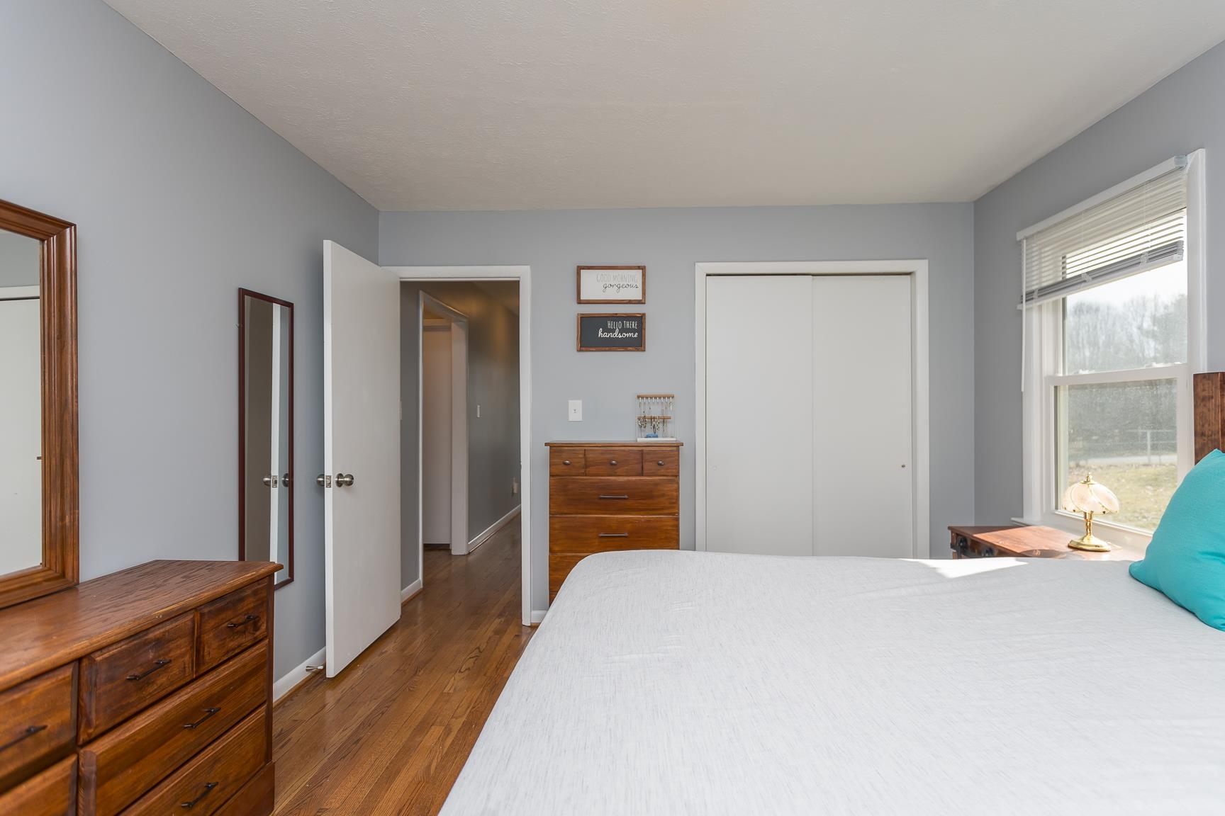 170 Quick's Mill Road Verona, VA 24482 - Photo 25 of 45 a bedroom with a bed and wooden floor