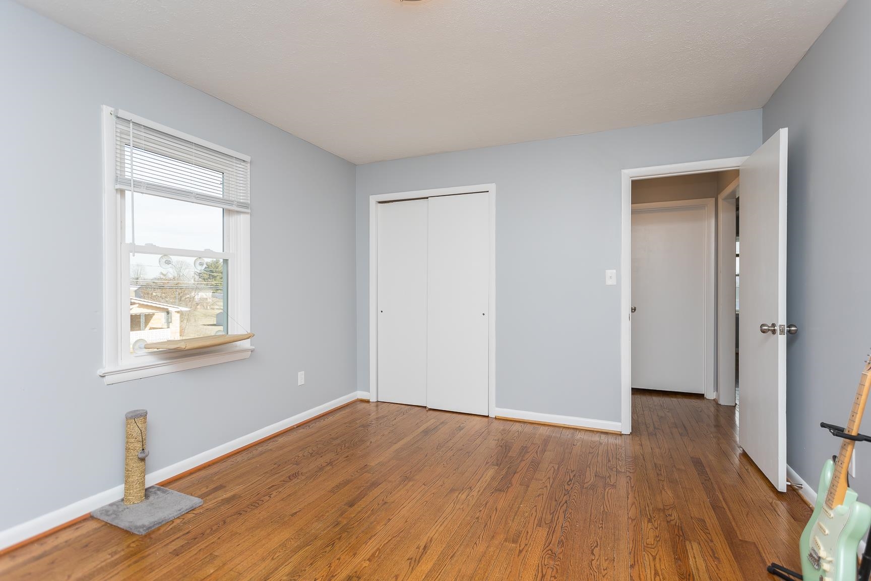 170 Quick's Mill Road Verona, VA 24482 - Photo 31 of 45 an empty room with wooden floor and windows