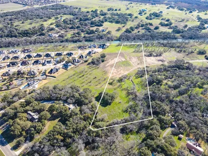 a view of swimming pool with a yard