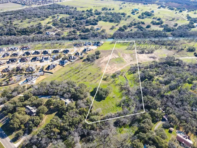 a view of swimming pool with a yard