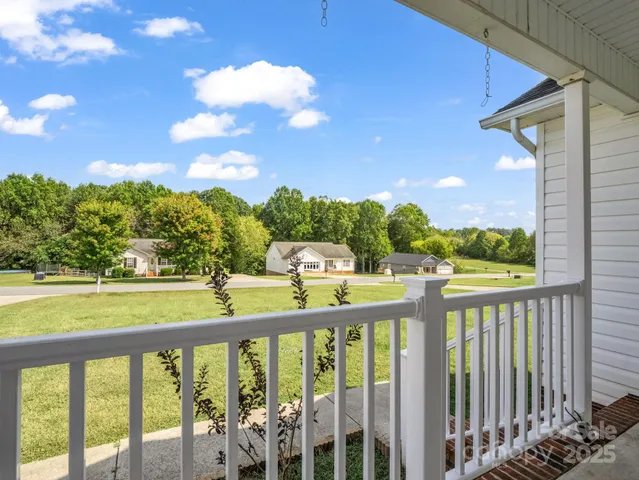 a view of a balcony with lake view