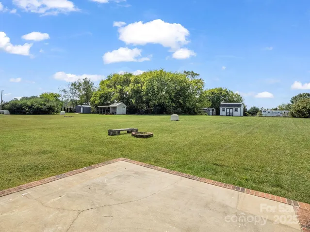 a view of a golf course with a lake