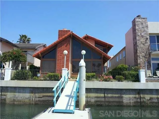 40 Green Turtle Road Coronado, CA 92118 - Photo 1 of 11 a front view of house with yard