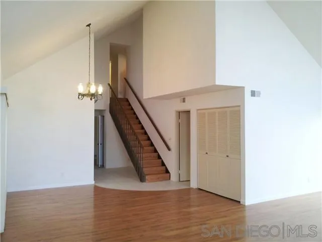 40 Green Turtle Road Coronado, CA 92118 - Photo 4 of 11 a view of an entryway with wooden floor
