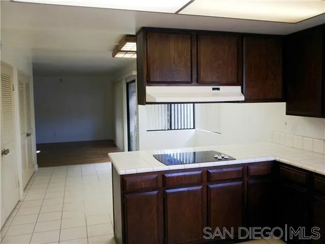 40 Green Turtle Road Coronado, CA 92118 - Photo 6 of 11 a view of kitchen with cabinets