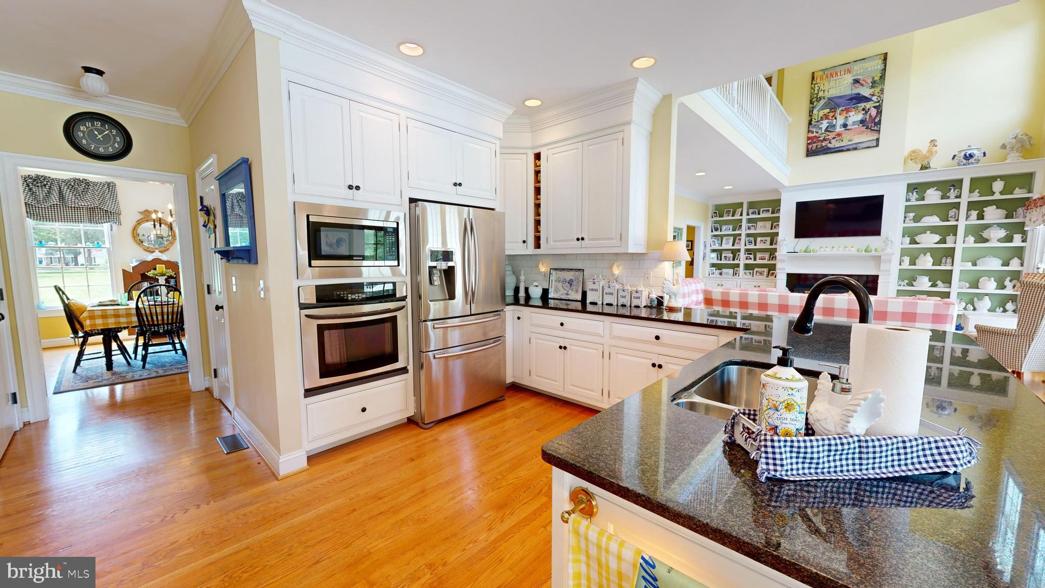 28028 Playtor Road Easton, MD 21601 - Photo 22 of 80 a living room with stainless steel appliances furniture and a view of kitchen