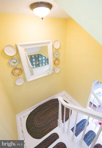 a aerial view of a house with sitting area and garden