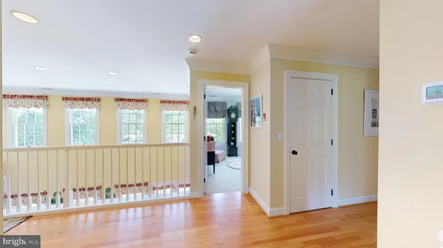 a view of a swimming pool with an outdoor space and seating area