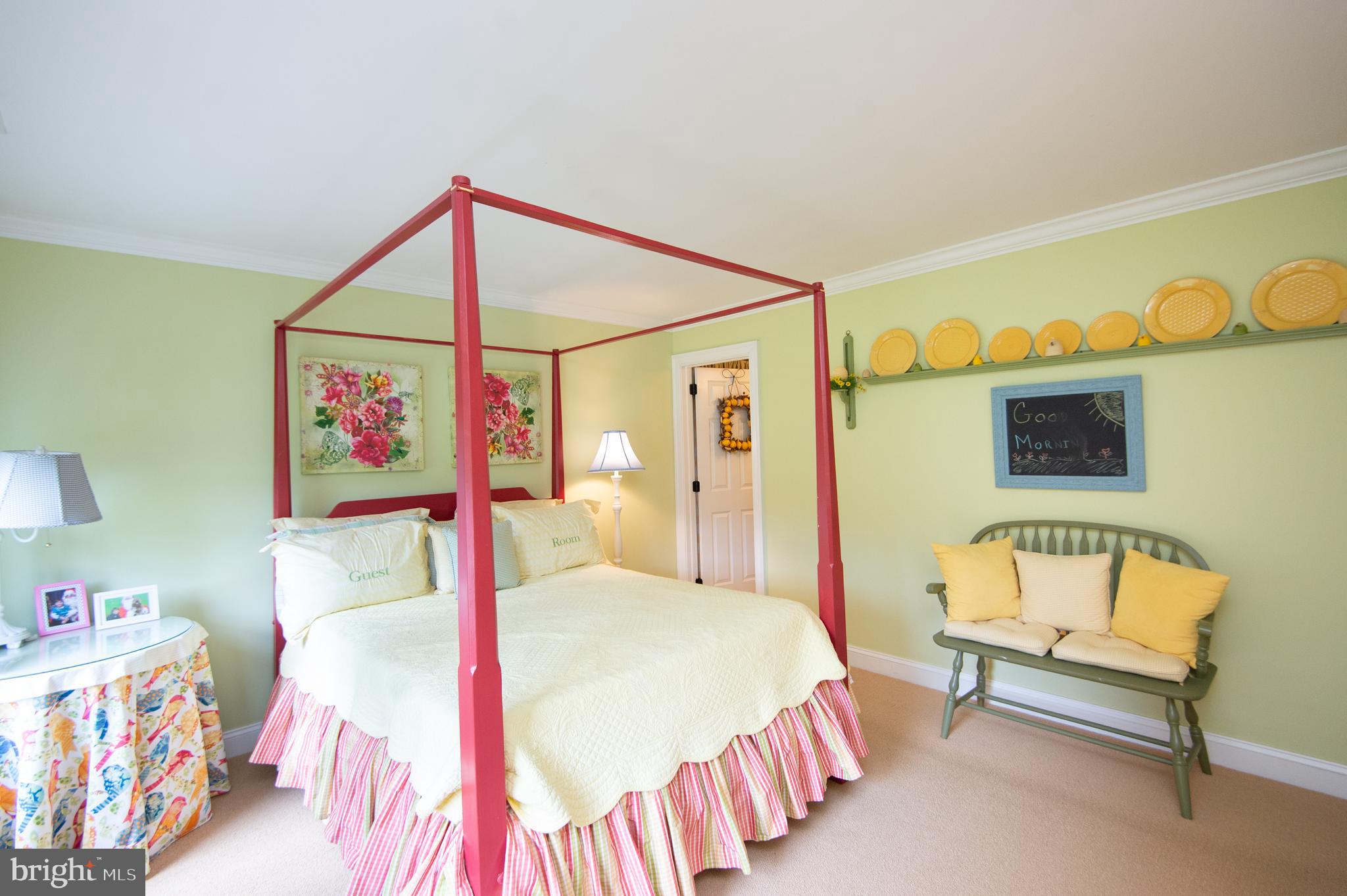 28028 Playtor Road Easton, MD 21601 - Photo 41 of 80 a bed room with a bed and a couch