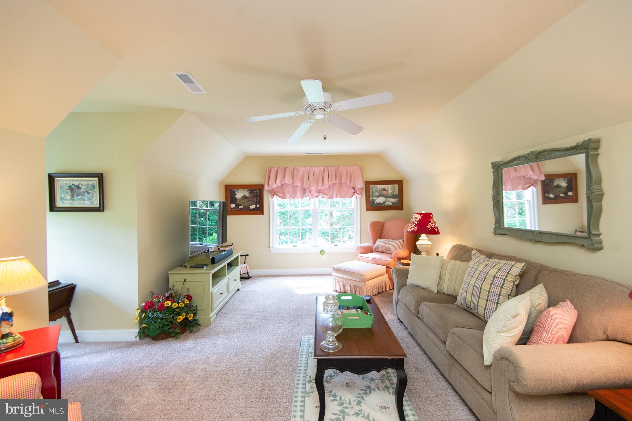 28028 Playtor Road Easton, MD 21601 - Photo 54 of 80 a living room with furniture and a large window