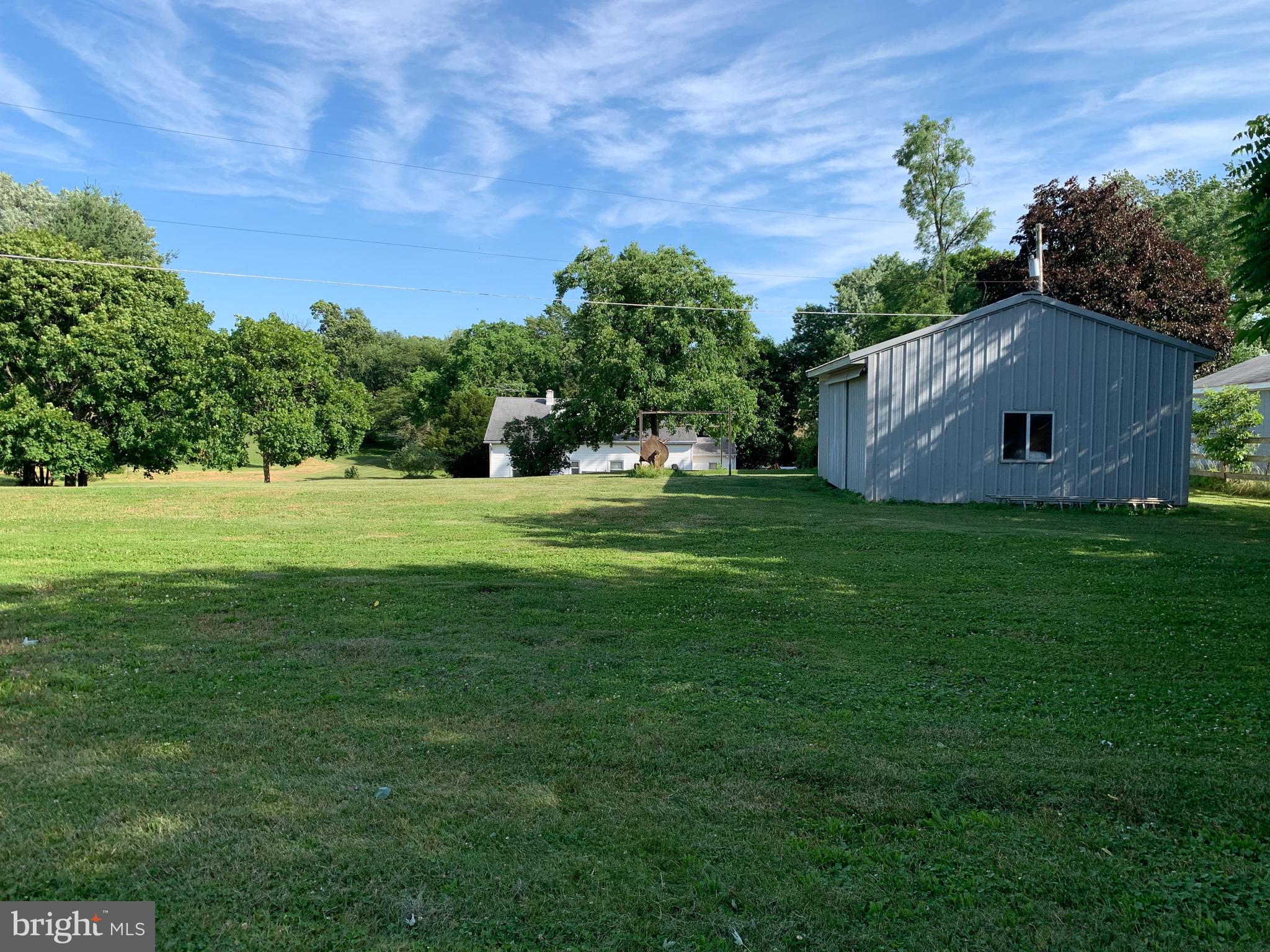11350 Baker Road Keymar, MD 21757 - Photo 84 of 102 back yard facing pole barn and house